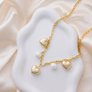 taudrey the giving heart necklace by brianne manz