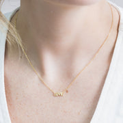 taudrey love is gold necklace